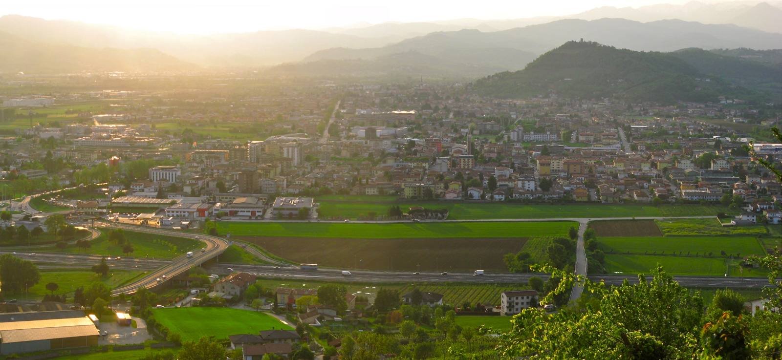 Montecchio Maggiore and the plain at sunset, seen from the hills