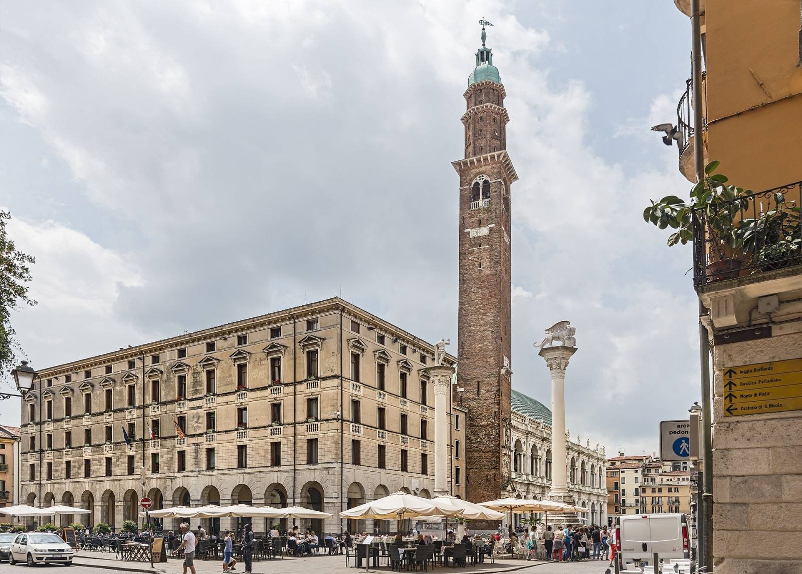 Piazza dei Signori in Vicenza with the tall Torre Bissara and café tables