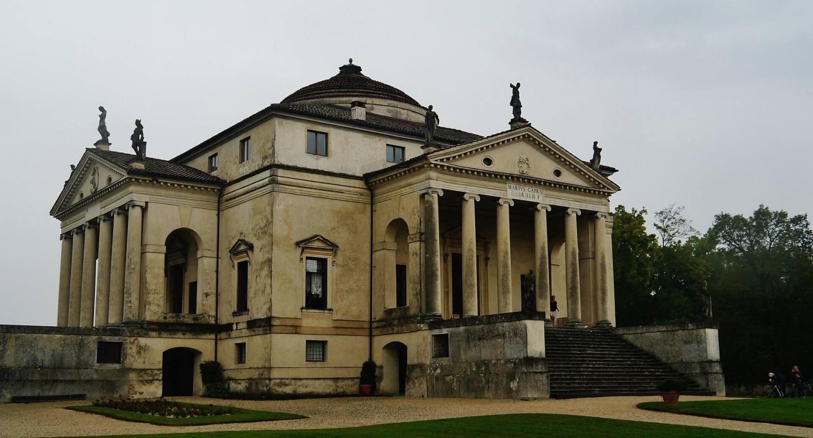 Villa La Rotonda behind its garden wall and cypress trees outside Vicenza